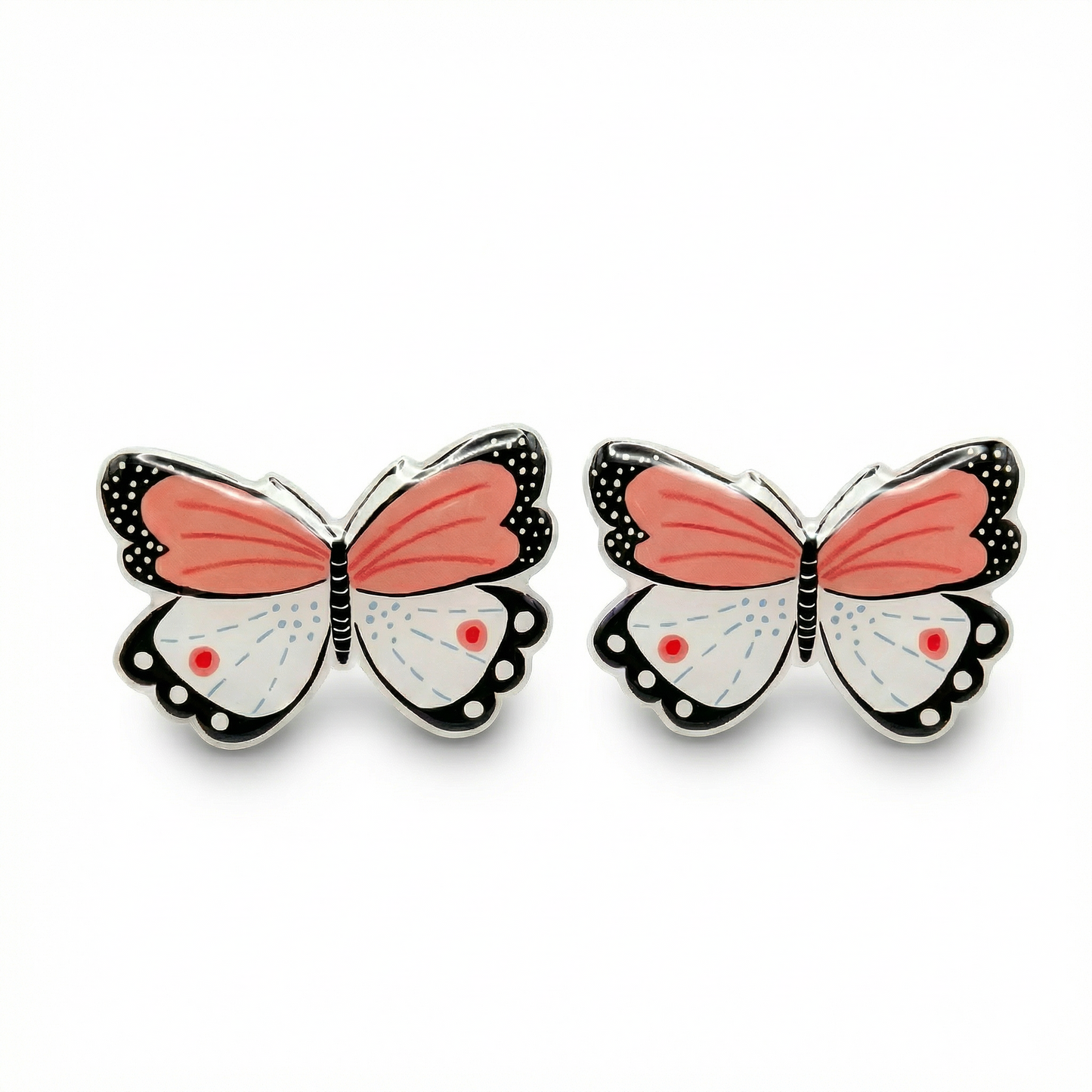 Butterfly-shaped earrings with pink wings on a white background