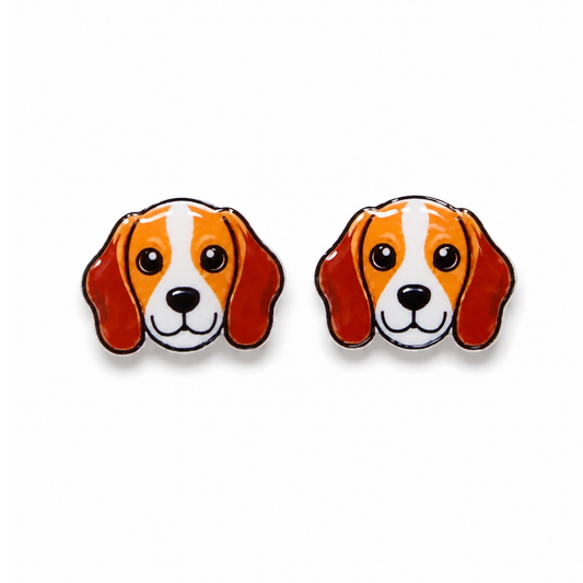 A pair of dog face stud earrings shaped like a beagle, featuring orange, white, and red colors with black outlines, shown on a plain white background.