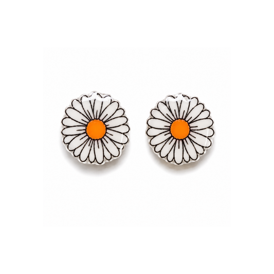A pair of white daisy stud earrings with black outlines and bright orange centers, displayed on a clean white background.