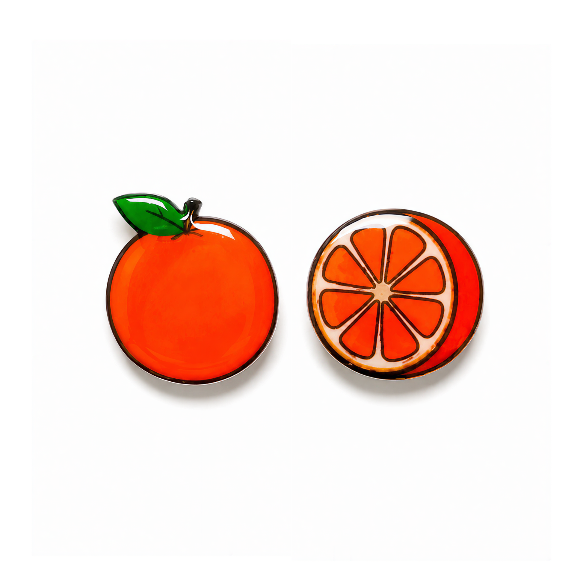 Two small orange titanium stud earrings on a plain white background: one whole orange with a green leaf and stem, and one cross-section of an orange showing segments.