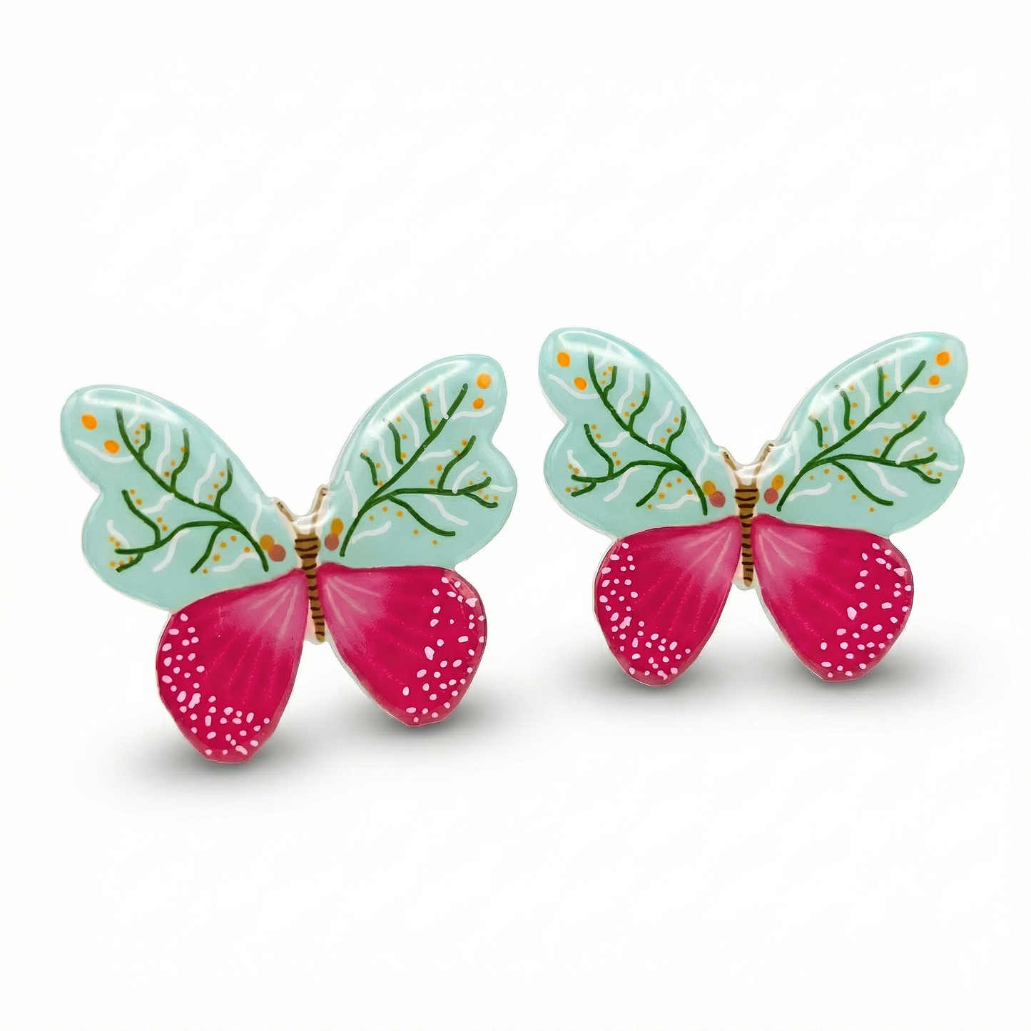 Butterfly-shaped earrings with green wings and pink bodies on a white background