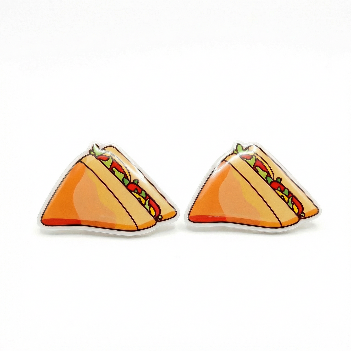 Sandwich-shaped earrings on a white background
