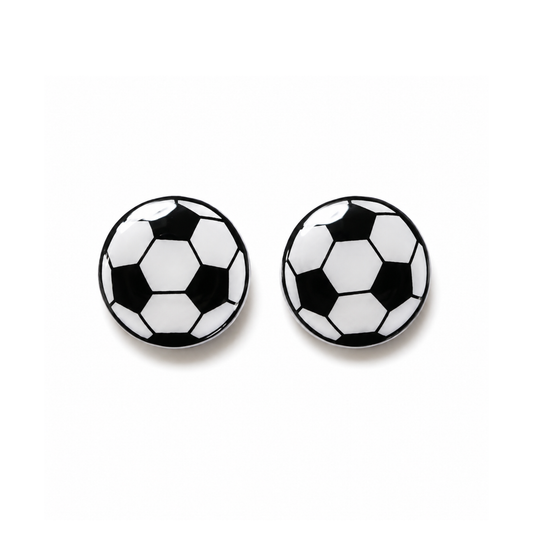 A pair of round stud earrings designed like classic black and white soccer balls, shown on a clean white background.