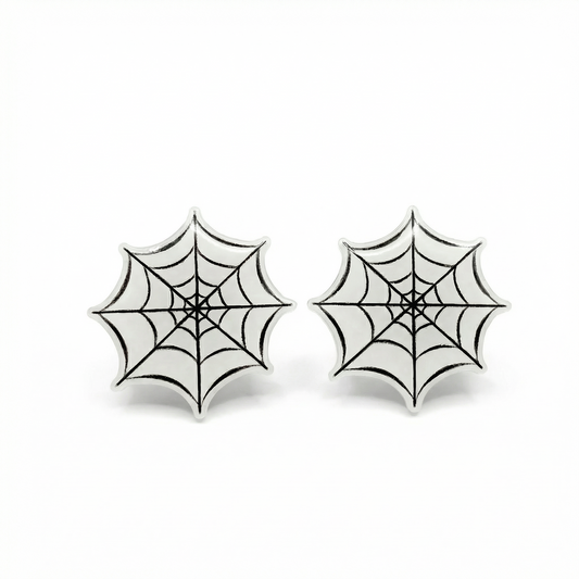 Pair of spider web earrings on a white background